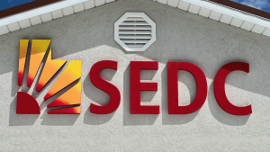 close up of new 3D SEDC sign on our building