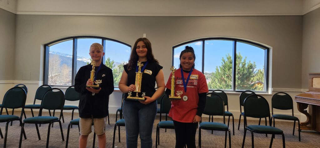 6th Annual Southwest Educational Development Center Regional Spelling Bee Finalists, L to R: Hayes Holyoak from Delta Middle School, Millard School District; Savannah Paul from Pine View Middle School, Washington SD and Audrey Ayala from Panorama Elementary in Washington SD.