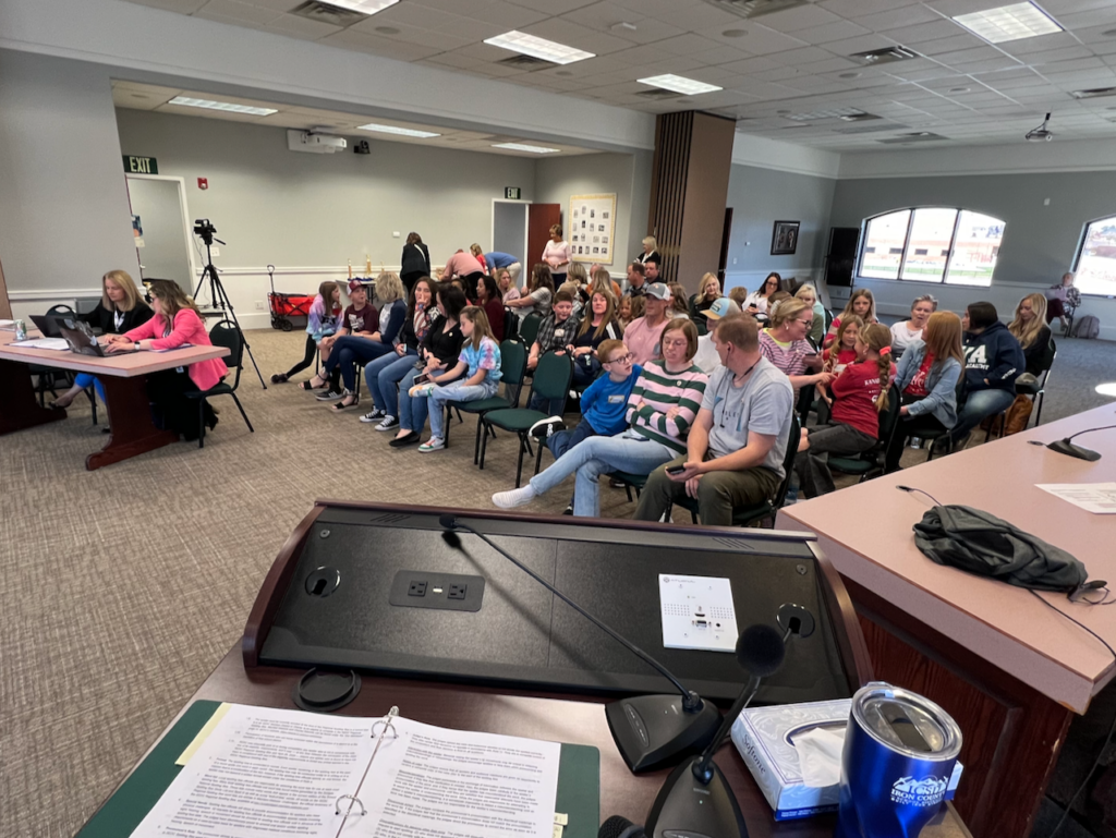 Pronouncers podium, judges, video streaming gear and rows of proud parents and family members await the start of the 6th Annual SEDC Regional Spelling Bee, in the Boardrooms of Iron County School District in Cedar City, Utah.